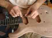 Guitarra electrica y acustica reparacion y calibr… segunda mano  Chile