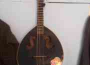 Vendo mandolina 25,000 color negro 8 cuerdas segunda mano  Chile