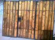 Porton de fierro y madera con puerta de entrada, usado segunda mano  Chile