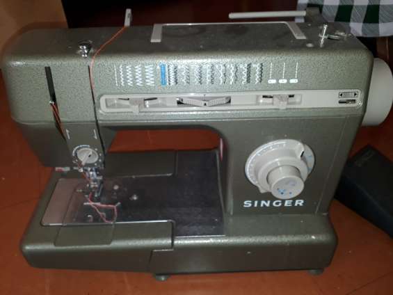 Vendo máquina de coser singer con garantía